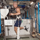 NASA astronaut Steve Swanson, equipped with a bungee harness, exercises on the T2 treadmill aboard the International Space Station (Image: NASA)